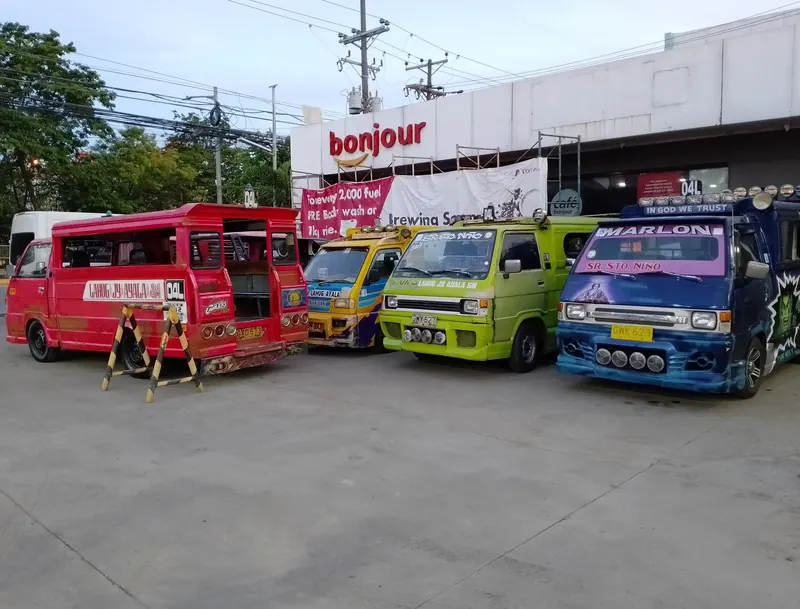 Jeepneys on the Total petrol station in Cebu City (2024-06-02)